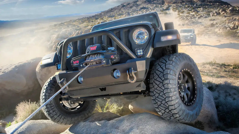 Warn VR Evo 10-S winch mounted on an off-road vehicle during a recovery