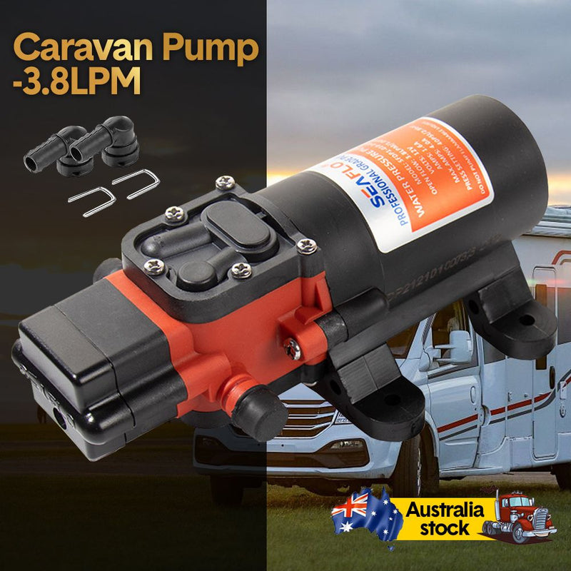 Seaflow 12V 3.8LPM caravan water pump with motorhome in the background