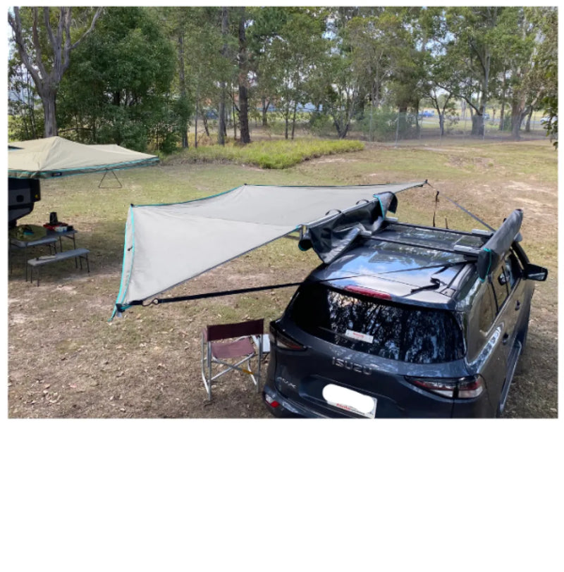 Car with a roof tent and 30 Second 180 Degree Wing Awning in camping setting