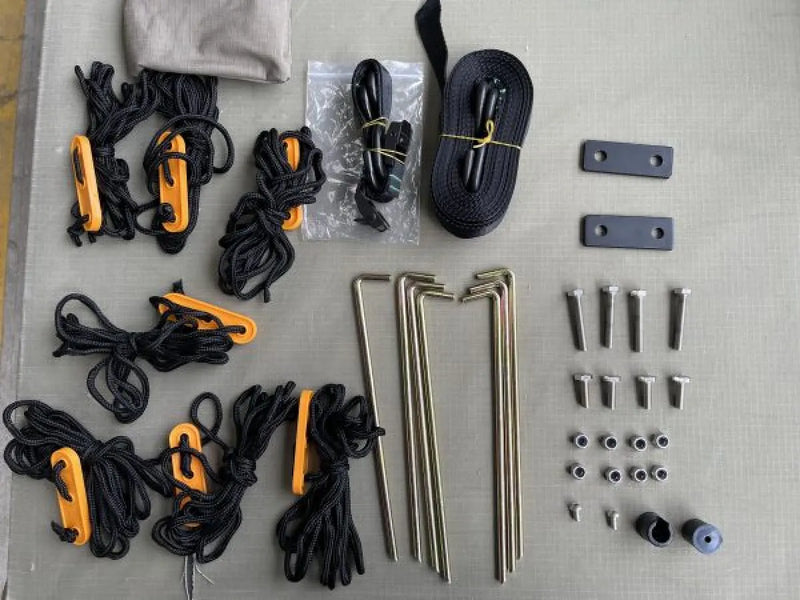 Collection of camping gear components for 30 Second 180 Degree Wing Awning second wing or outdoor setup