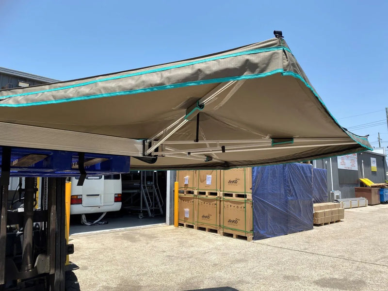 Retractable 30 Second Wing Awning extending over outdoor space for shade and comfort