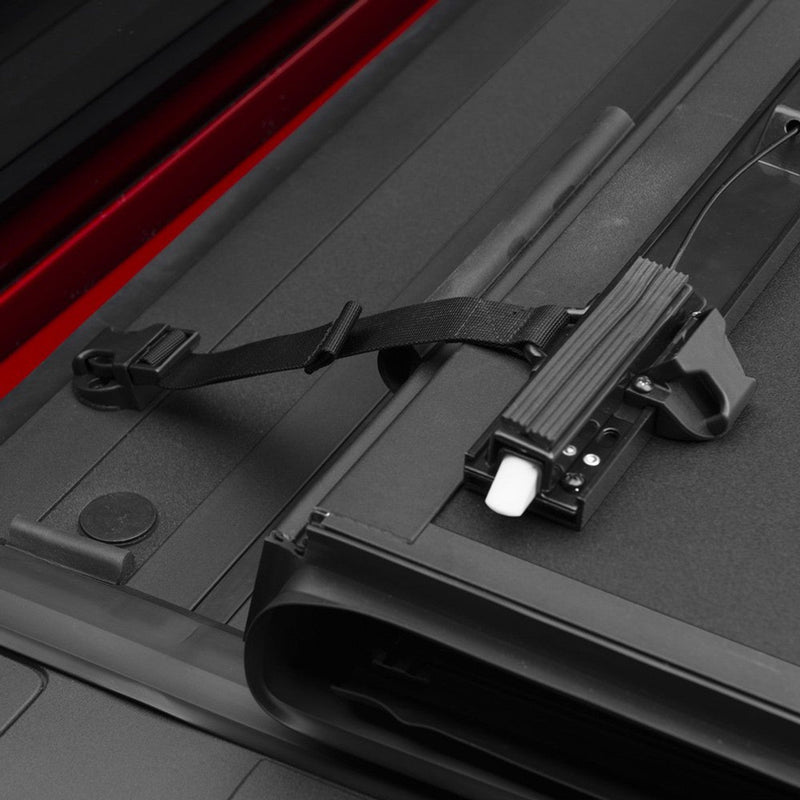 Close-up of the BAKFlip MX4 prop rod clip under the open cover