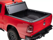 BAKFlip MX4 tonneau cover with one section folded open on a red RAM 1500