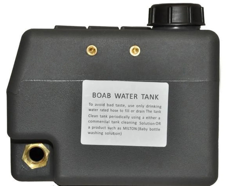 Black plastic water tank labeled BOAB WATER TANK with cap and connection ports for remote regions