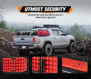 Gray pickup truck with Bunker Indust Recovery Tracks Mounting Kit and red traction board
