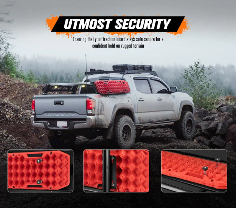 Gray pickup truck with Bunker Indust Recovery Tracks Mounting Kit and red traction board