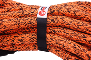 Coiled orange Carbon Offroad kinetic recovery rope secured with a black strap