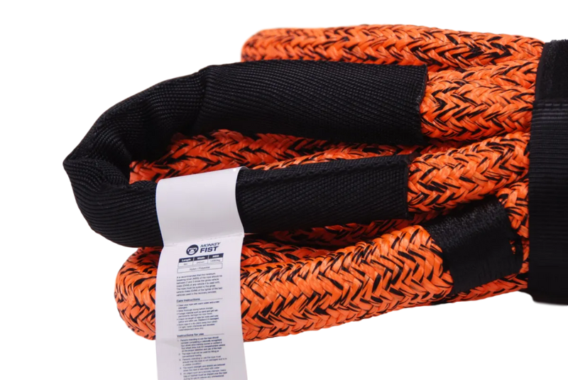 Heavy-duty orange and black braided kinetic recovery rope by Carbon Offroad with label