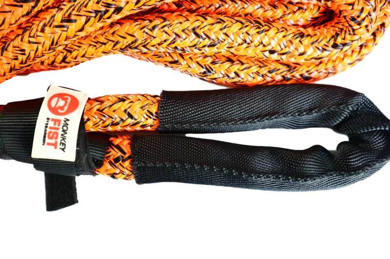 Orange and yellow braided synthetic kinetic recovery rope with black attachment loop for Carbon Offroad
