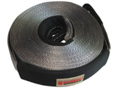 Coiled gray tow strap with black protective sleeve for winch recovery in a recovery kit