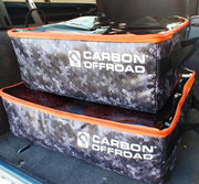 Carbon Offroad gear cube storage with camouflage pattern and orange trim on stacked containers