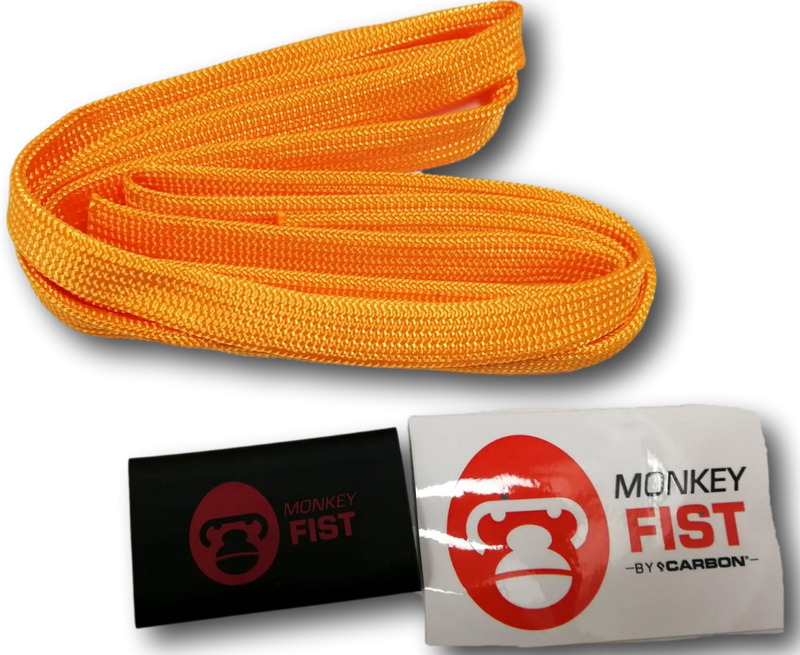 Bright orange monkey fist rope or safety rope coiled in a curved shape for offroad adventures