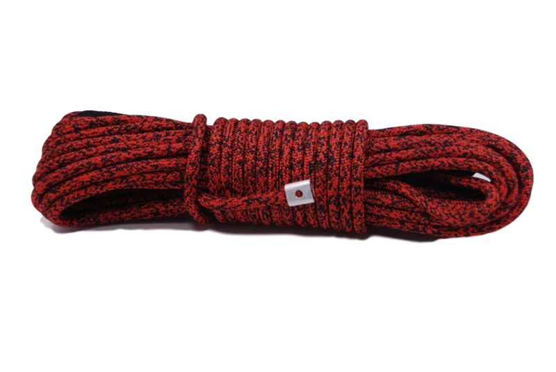 Coiled red carbon offroad winch rope with black flecks and white tag for low mount winch