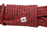 Coiled red and black speckled carbon offroad winch rope with metal fastener for low mount winch