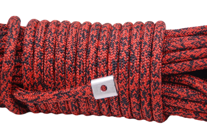Coiled red and black speckled carbon offroad winch rope with metal fastener for low mount winch