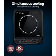 Devanti induction cooktop with sleek black design and digital controls