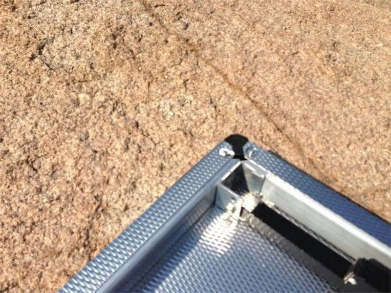 Stainless steel corner bracket with perforated surface for Eezi-Awn K9 Large Stainless Steel Camping Table