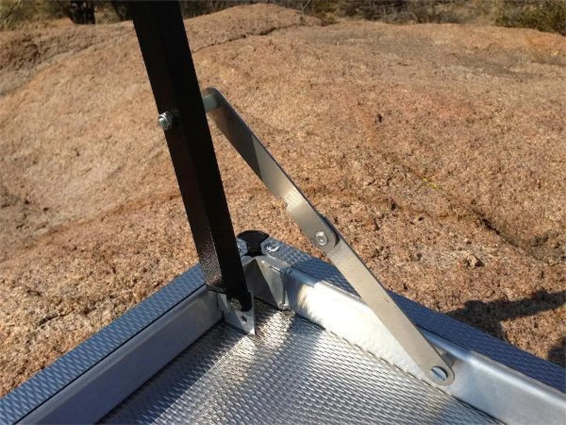 Folding metal step with black strap for Eezi-Awn K9 Large Stainless Steel Camping Table