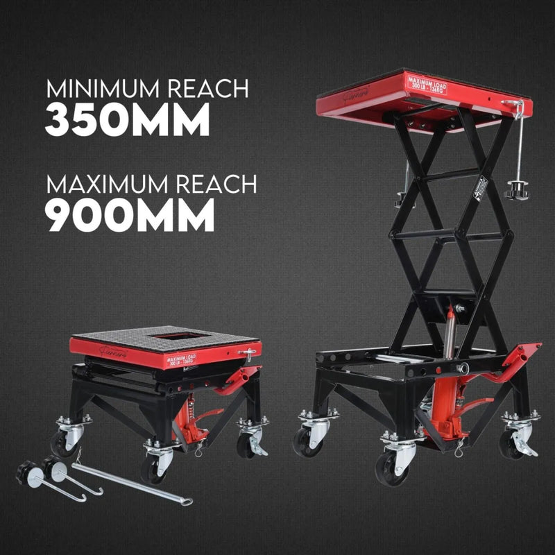 Scissor lift table with minimum and maximum reach measurements on a dark background
