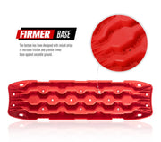 Red plastic recovery boards with wavy ridges and traction holes for off-road recovery tracks