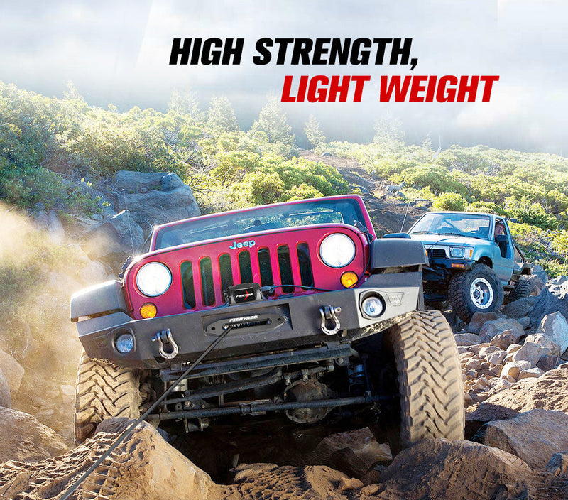 Red off-road Jeep with oversized tires climbing rocky terrain using Dyneema synthetic winch rope