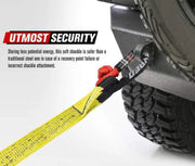 Yellow tow strap attached to vehicle’s recovery point with FieryRed 15t Soft Shackle