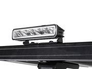 LED light bar mounted on vehicle roof rack with Front Runner bracket