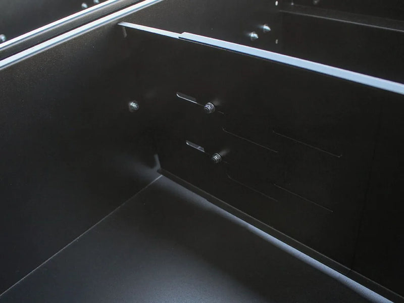 Sleek black car dashboard with Front Runner drawer dividers