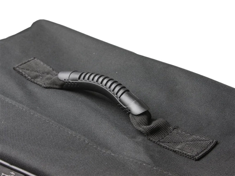 Black fabric handle on textured surface of Front Runner Foldable Roof Top Transit Bag for extra large pack storage