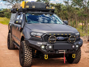 Rugged Ford Ranger with Front Runner roof rack kit, custom bumper, and off-road tires