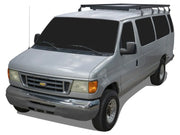Silver Ford E-Series passenger van with roof rack kit for extended cab models