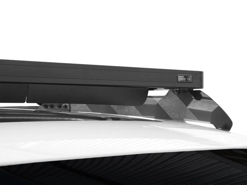 Car with Front Runner Ford Everest Slimline II Roof Rack Kit for secure luggage transport