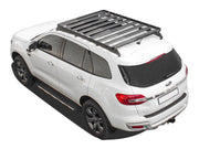 White SUV with Front Runner Ford Everest Slimline II Roof Rack Kit and roof rack