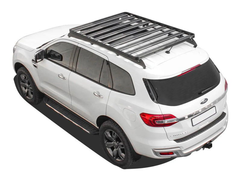 White SUV with Front Runner Ford Everest Slimline II Roof Rack Kit and roof rack