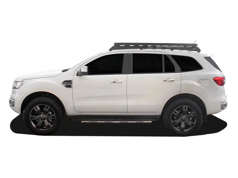 White SUV with roof rack kit and slimline II tray, dark wheels, Front Runner Ford Everest