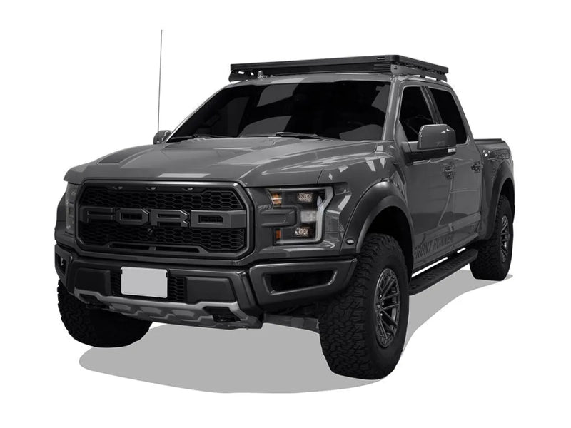 Ford F-150 Raptor with off-road modifications displaying Front Runner roof rack kit