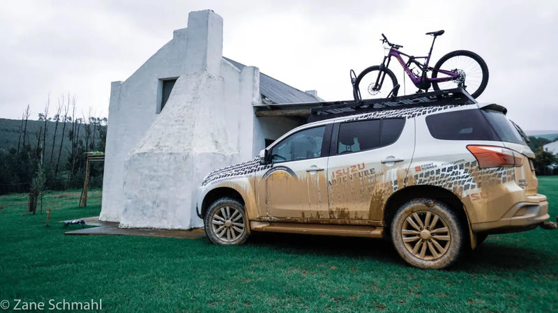Muddy SUV with bicycle on roof rack kit for Isuzu MU-X 2017-2020