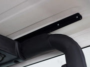 Black metal hinge attached to surface for Jeep Wrangler roof rack kit