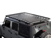 Front Runner Jeep Wrangler JK roof rack kit mounted on a Jeep Wrangler for off-road adventures