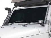 Off-road vehicle snorkel mounted near JKU windshield spot light brackets on a 4x4
