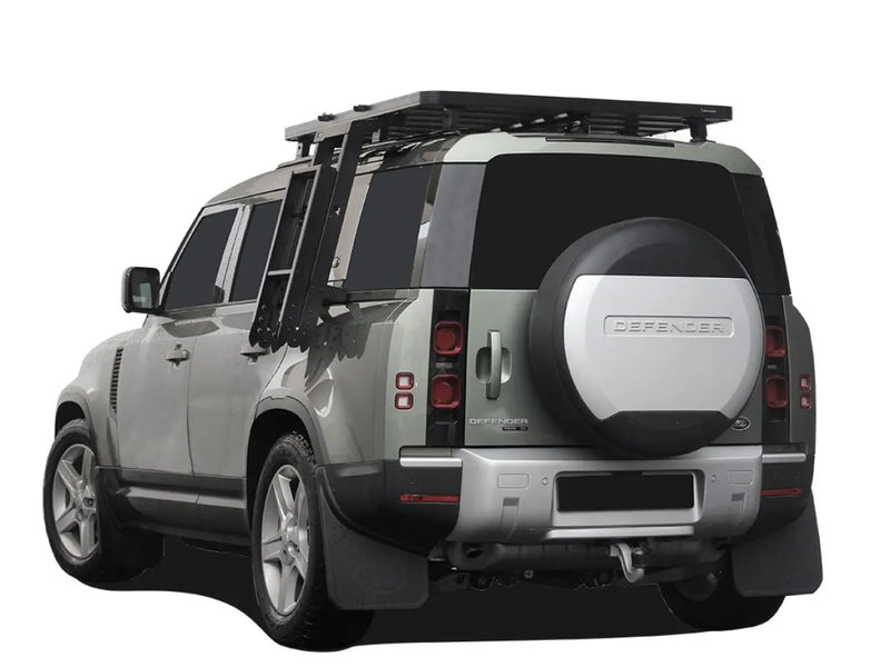 Land Rover Defender SUV with roof rack and spare tire cover for Rover Defender models