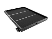 Slide-out cargo slide for load bed cargo with textured black surface and metal edges