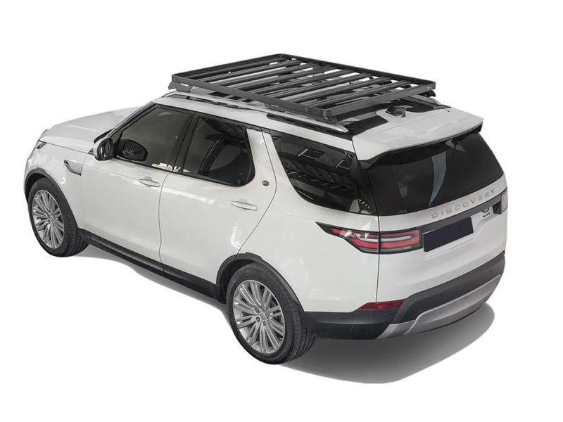 White Land Rover Discovery SUV with Front Runner LR Roof Rack Kit for Expedition use