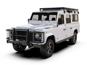 White Land Rover Defender with Front Runner LR Defender 110 roof rack kit and grille guard