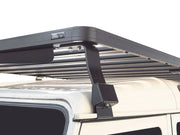 Roof rack kit mounted on top of a vehicle for versatile storage and transportation