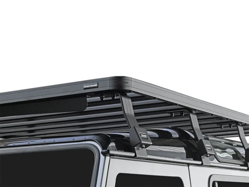 Roof rack kit mounted on a vehicle for enhanced storage, compatible with Front Runner LR Defender 90 Slimline II