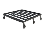 Black metal roof rack with parallel bars and adjustable feet for LR Defender Slimline II