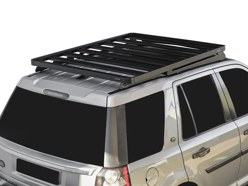 Silver SUV with Front Runner LR Freelander Slimline II Roof Rack Kit roof rack mounted on top