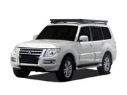 White Mitsubishi Pajero SUV with Front Runner Slimline II roof rack kit and tray