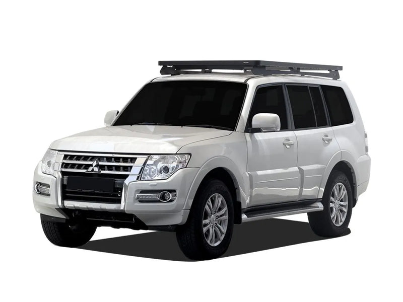 White Mitsubishi Pajero SUV with Front Runner Slimline II roof rack kit and tray